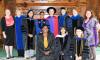 Students participating in the Gender and Women's Studies hooding ceremony